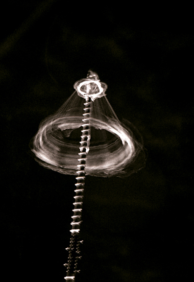 Members of the Cumbre Tajn Festival de la Identidad, perform the Mexican ritual ceremony Voladores - 5 men climb to a tiny platform at the top of a 20 meter pole, and while one man sits on the platform beating out a rhythm, the other four descend on ropes, setting the platform spinning as they spiral back to earth.