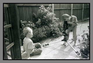 ryan and liam playing in the garden with mamiya c330f